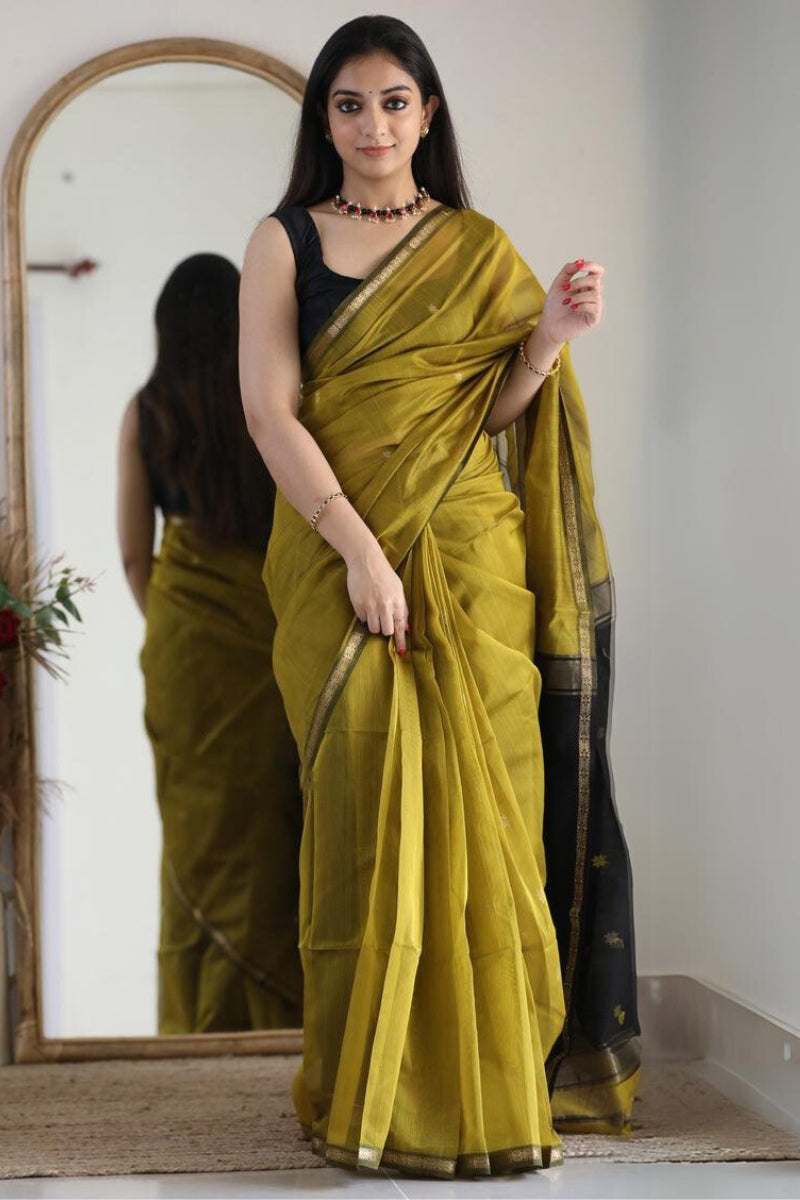 Tantalizing Mehndi Cotton Silk Saree With Serendipity Blouse Piece