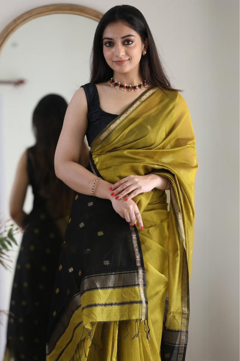 Tantalizing Mehndi Cotton Silk Saree With Serendipity Blouse Piece