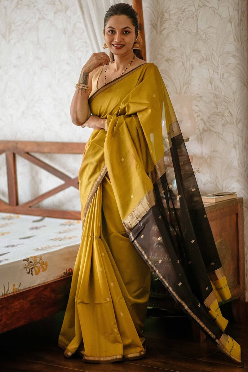 Proficient Mustard Cotton Silk Saree With Engaging Blouse Piece