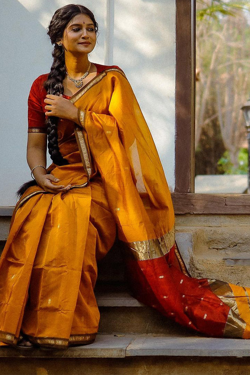 Smashing Yellow Cotton Silk Saree With Glamorous Blouse Piece