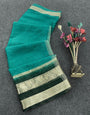 Sempiternal Sea Green Orgeanza Silk Saree With Denouement Blouse Piece