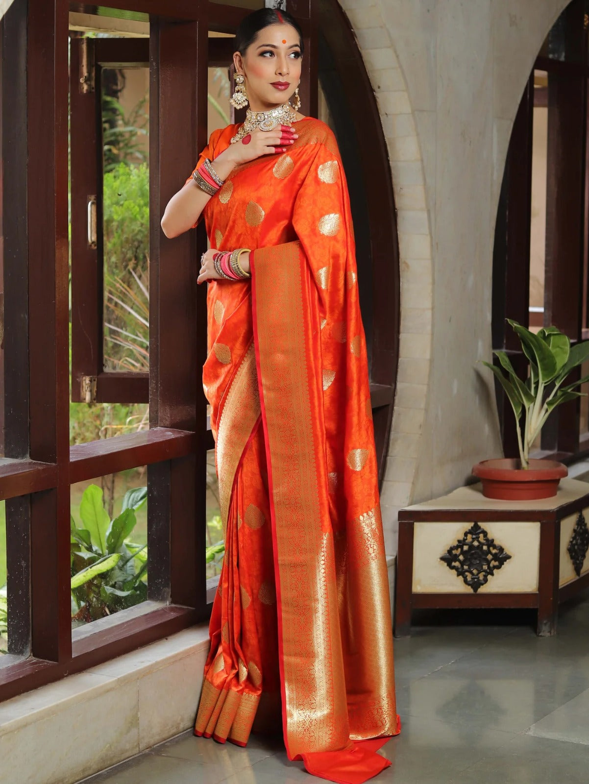 An insanely Orange Soft Silk Saree With Ephemeral Blouse Piece