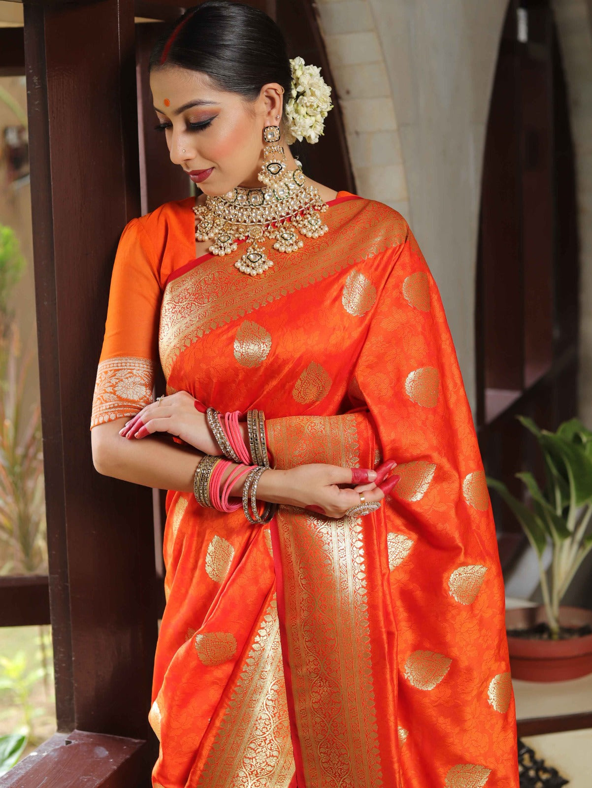 An insanely Orange Soft Silk Saree With Ephemeral Blouse Piece