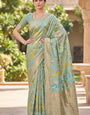 Murmurous Sea Green Khadi Georgette Banarasi Silk Saree With Inspiring Blouse Piece