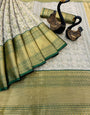 Mellifluous Dark Green Kanjivaram Silk Saree With Gossamer Blouse Piece