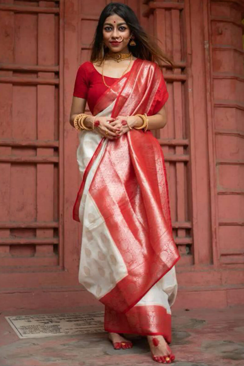 Entrancing Off White Soft Silk Saree With Fugacious Blouse Piece