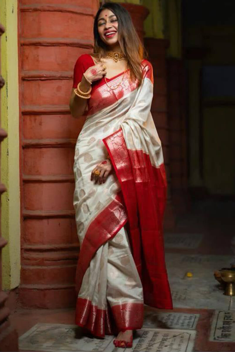 Entrancing Off White Soft Silk Saree With Fugacious Blouse Piece