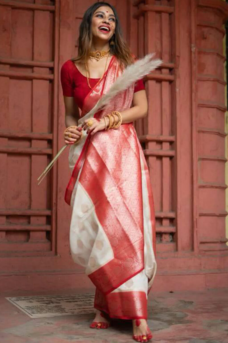 Entrancing Off White Soft Silk Saree With Fugacious Blouse Piece