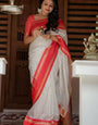 Luxuriant White Soft Silk Saree With Piquant Blouse Piece