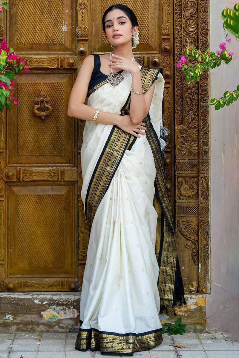 Prettiest Off White Soft Silk Saree With Glowing Blouse Piece