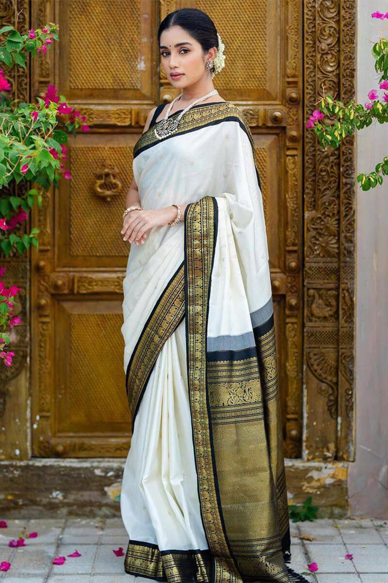 Prettiest Off White Soft Silk Saree With Glowing Blouse Piece