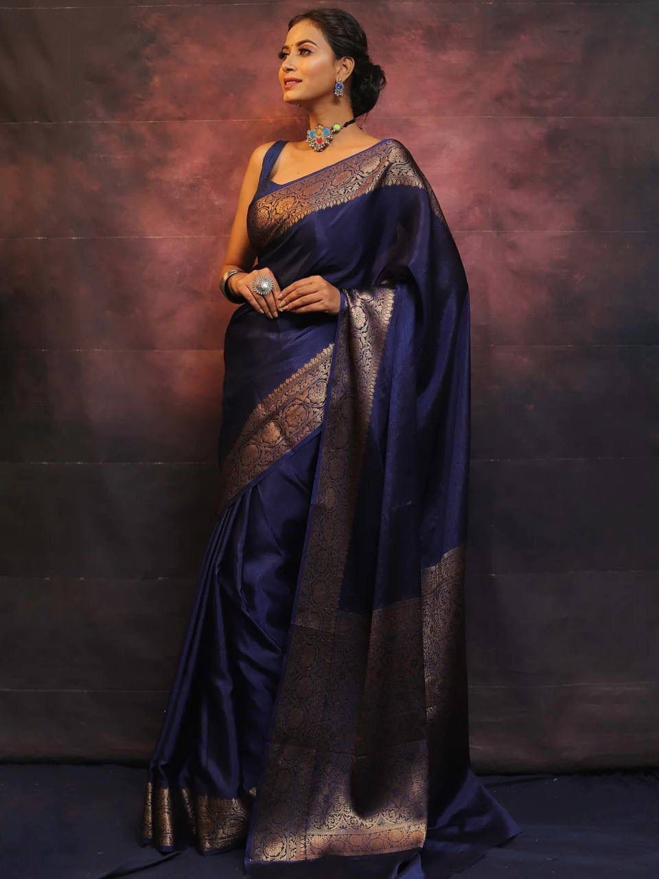 Bewitching Navy Blue Soft Silk Saree With Eloquence Blouse Piece