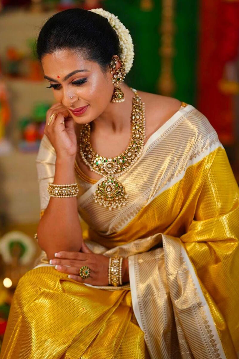 Supernal Yellow Kanjivaram Silk Saree With Elision Blouse Piece