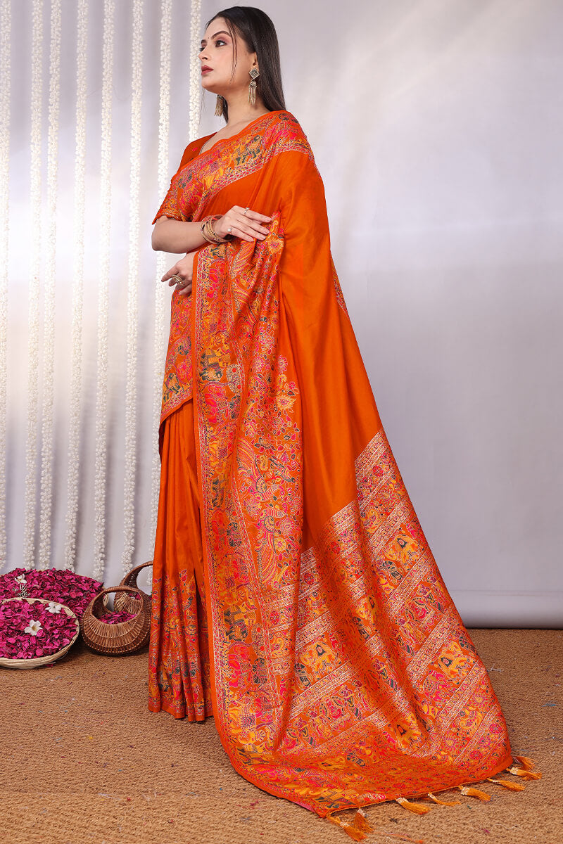 Enchanting Orange Pashmina Saree With Winsome Blouse Piece