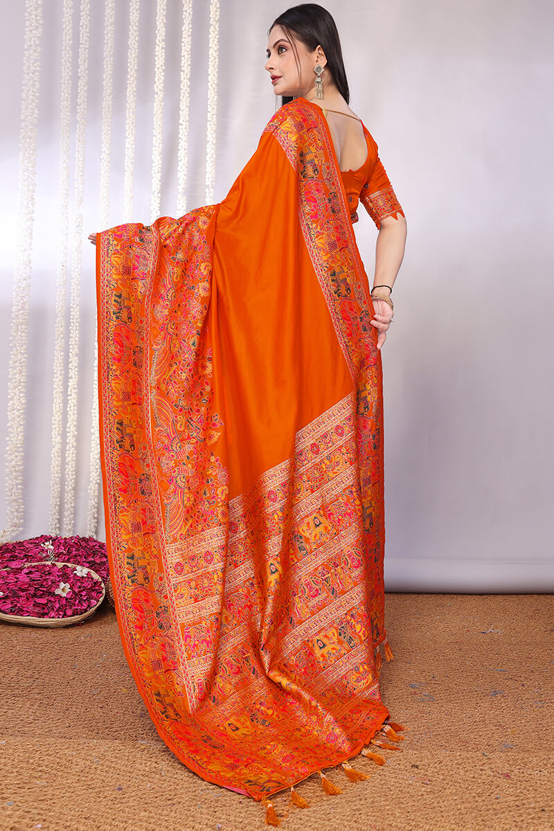 Enchanting Orange Pashmina Saree With Winsome Blouse Piece