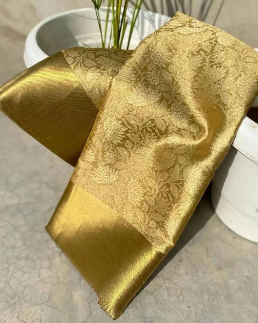 Super extravagant Golden Soft Tissue Silk Saree With Lovely Blouse Piece