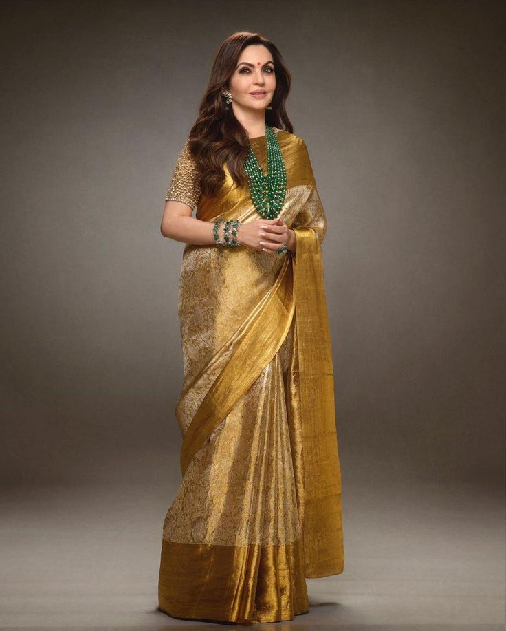 Super extravagant Golden Soft Tissue Silk Saree With Lovely Blouse Piece