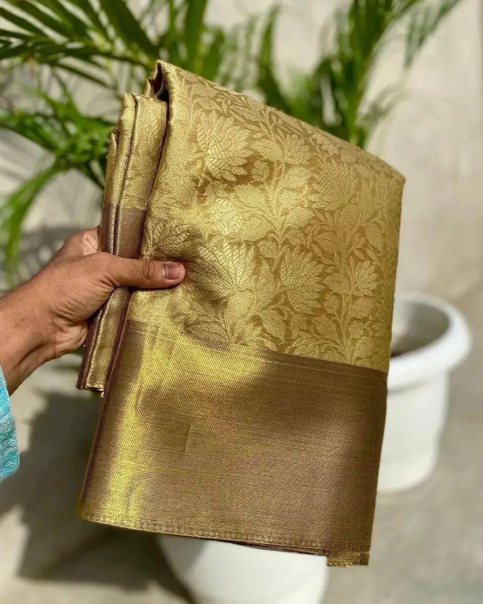 Super extravagant Golden Soft Tissue Silk Saree With Lovely Blouse Piece