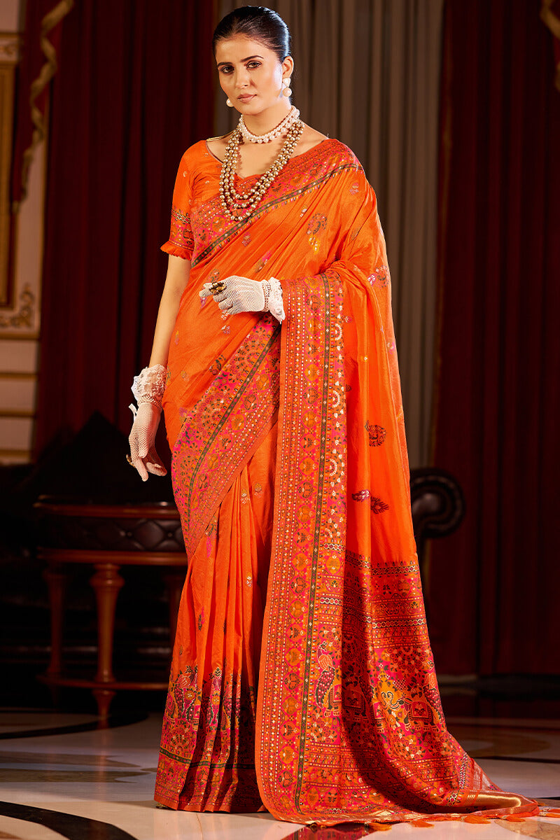 Seraglio Orange Pashmina Saree With Splendiferous Blouse Piece