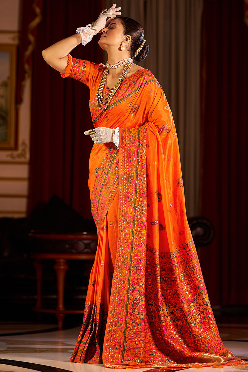 Seraglio Orange Pashmina Saree With Splendiferous Blouse Piece