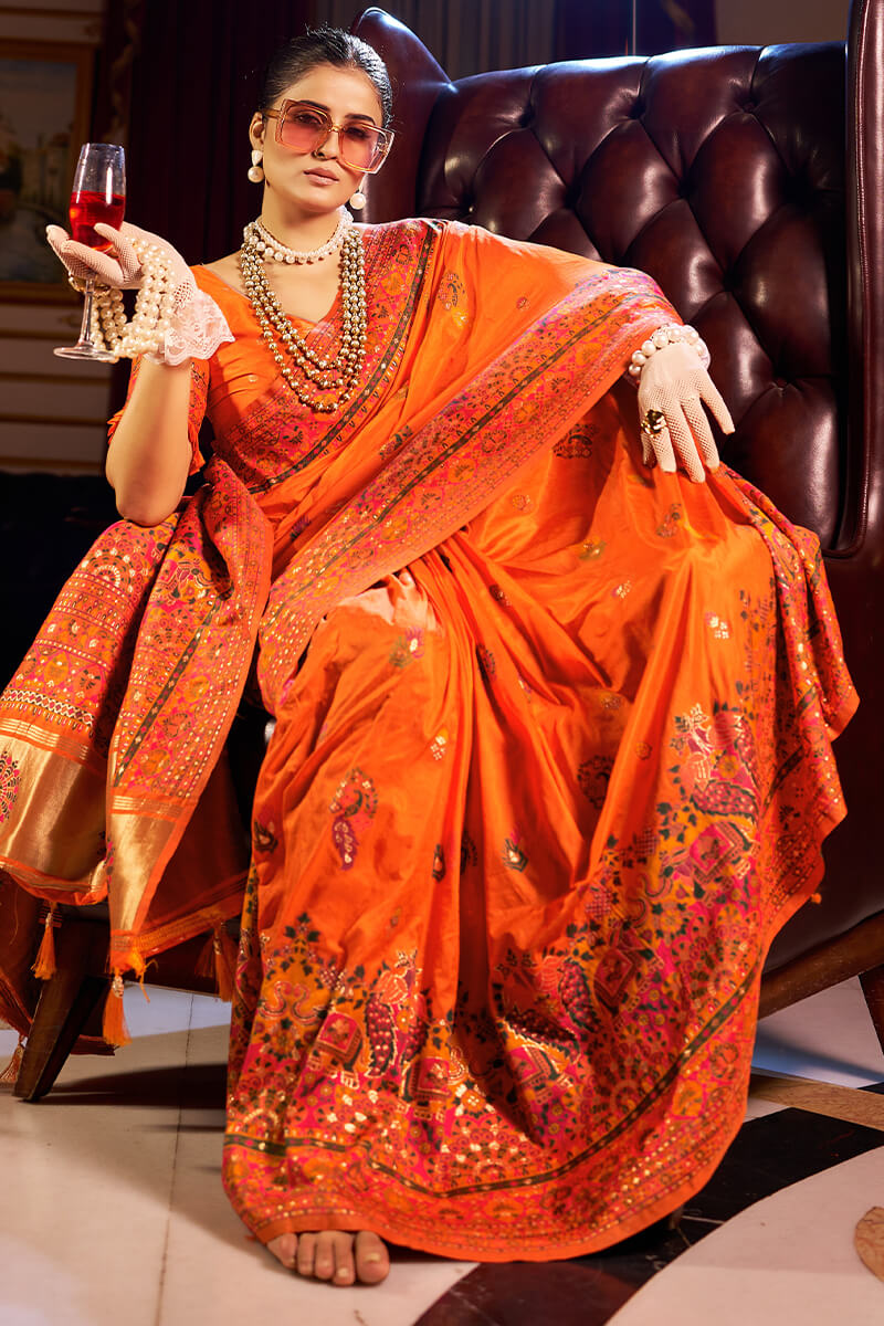 Seraglio Orange Pashmina Saree With Splendiferous Blouse Piece