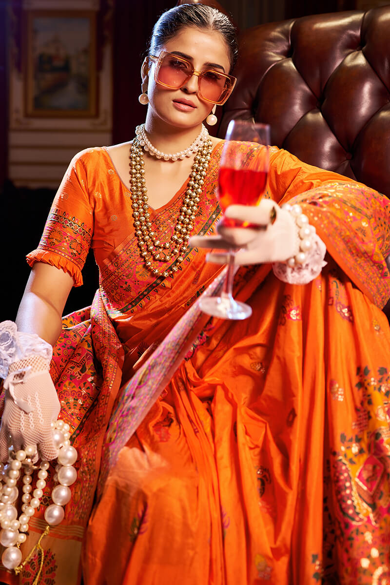 Seraglio Orange Pashmina Saree With Splendiferous Blouse Piece