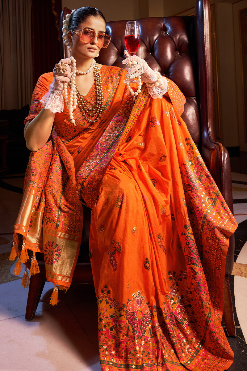 Seraglio Orange Pashmina Saree With Splendiferous Blouse Piece