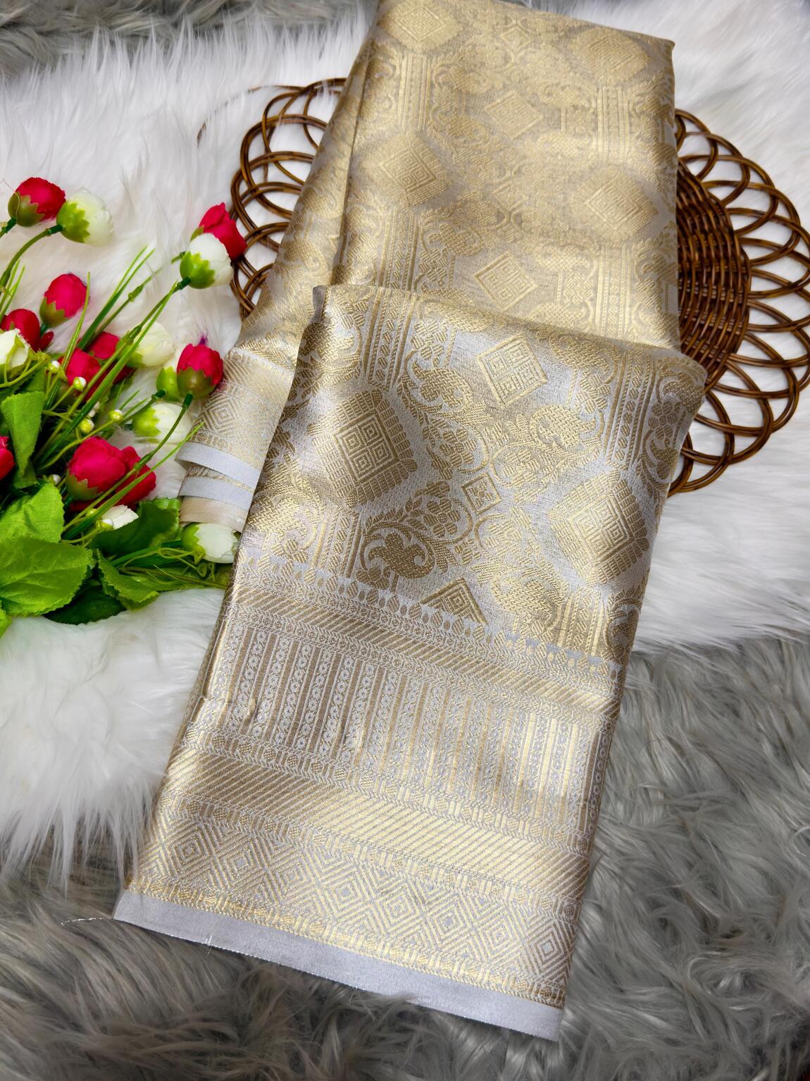 Luxuriant Silver Soft Tissue Silk Saree With Epiphany Blouse Piece