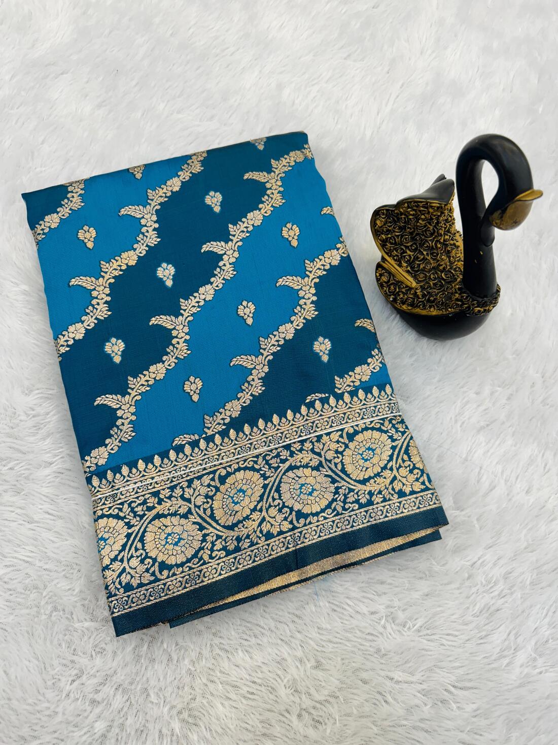 Unique Blue Soft Banarasi Silk Saree With Hypnotic Blouse Piece