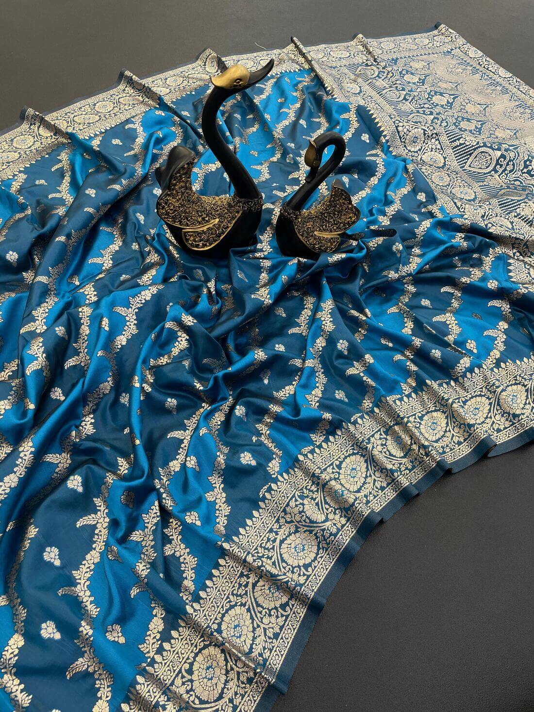 Unique Blue Soft Banarasi Silk Saree With Hypnotic Blouse Piece