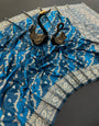 Unique Blue Soft Banarasi Silk Saree With Hypnotic Blouse Piece