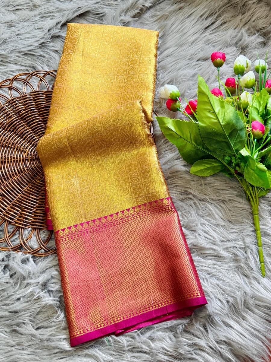 Lissome Golden Soft Tissue Silk Saree With Adoring Blouse Piece
