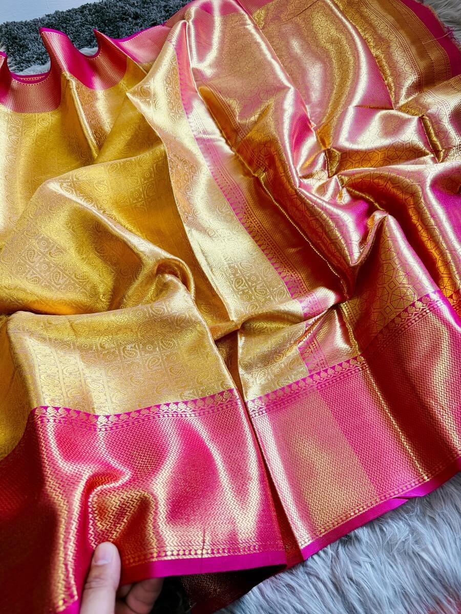Lissome Golden Soft Tissue Silk Saree With Adoring Blouse Piece