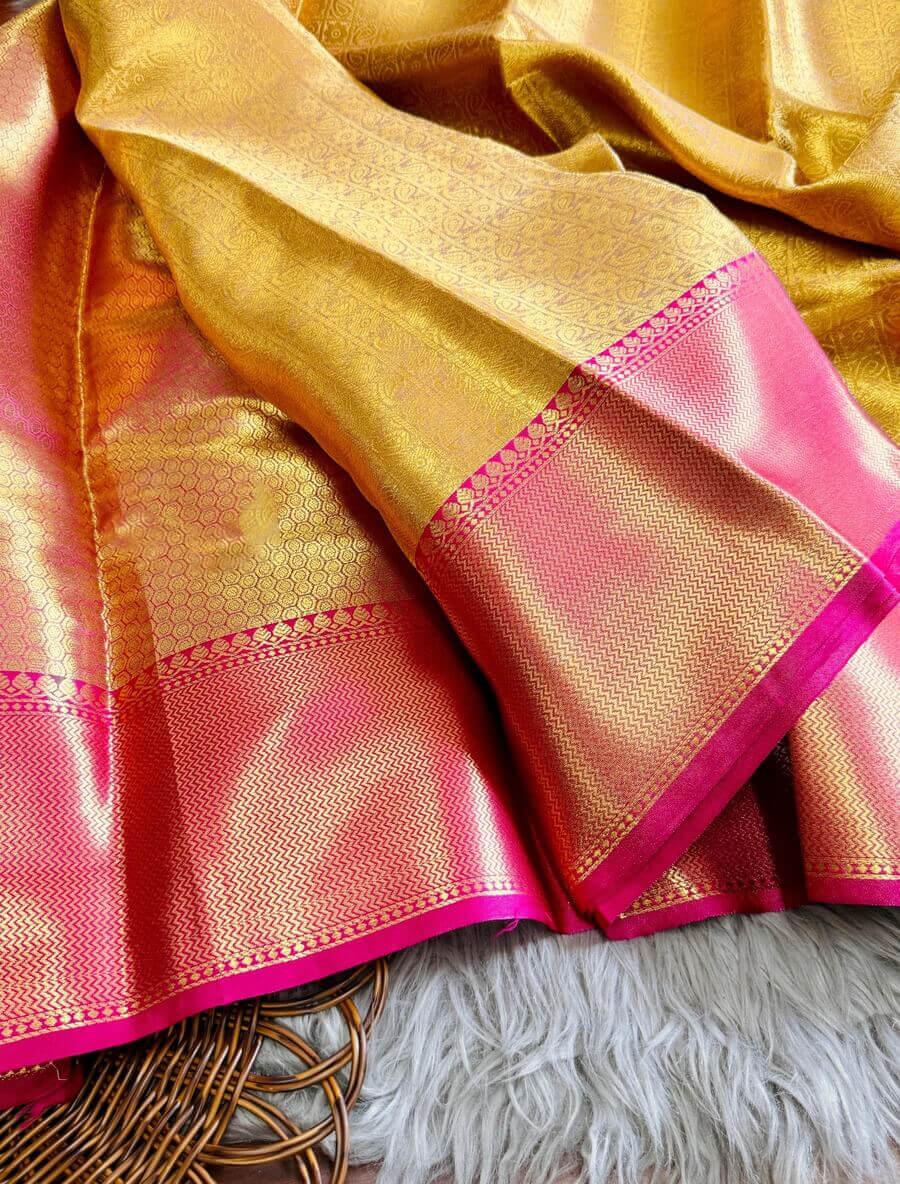 Lissome Golden Soft Tissue Silk Saree With Adoring Blouse Piece