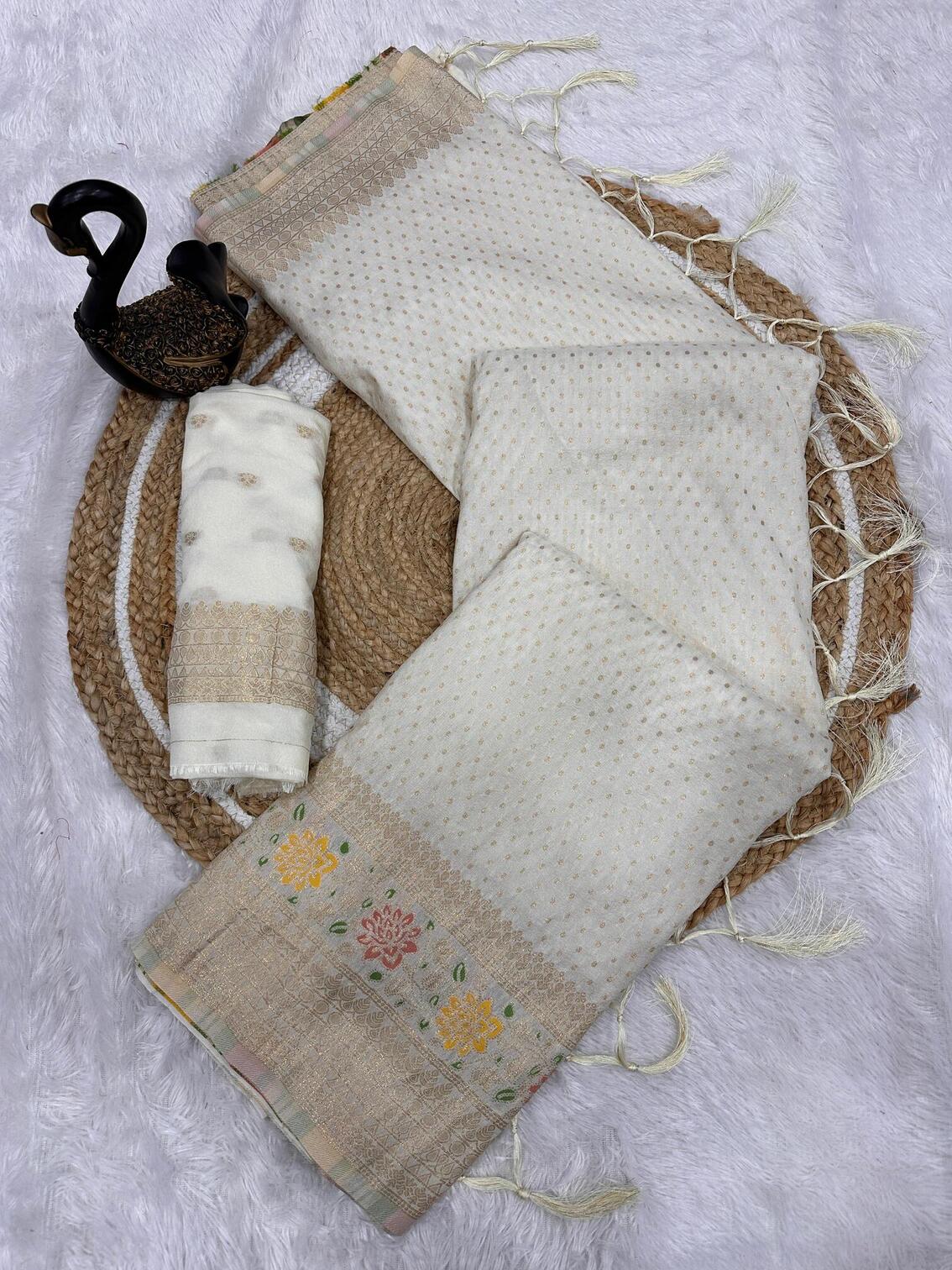 Dissemble Off White Soft Banarasi Silk Saree With Elision Blouse Piece