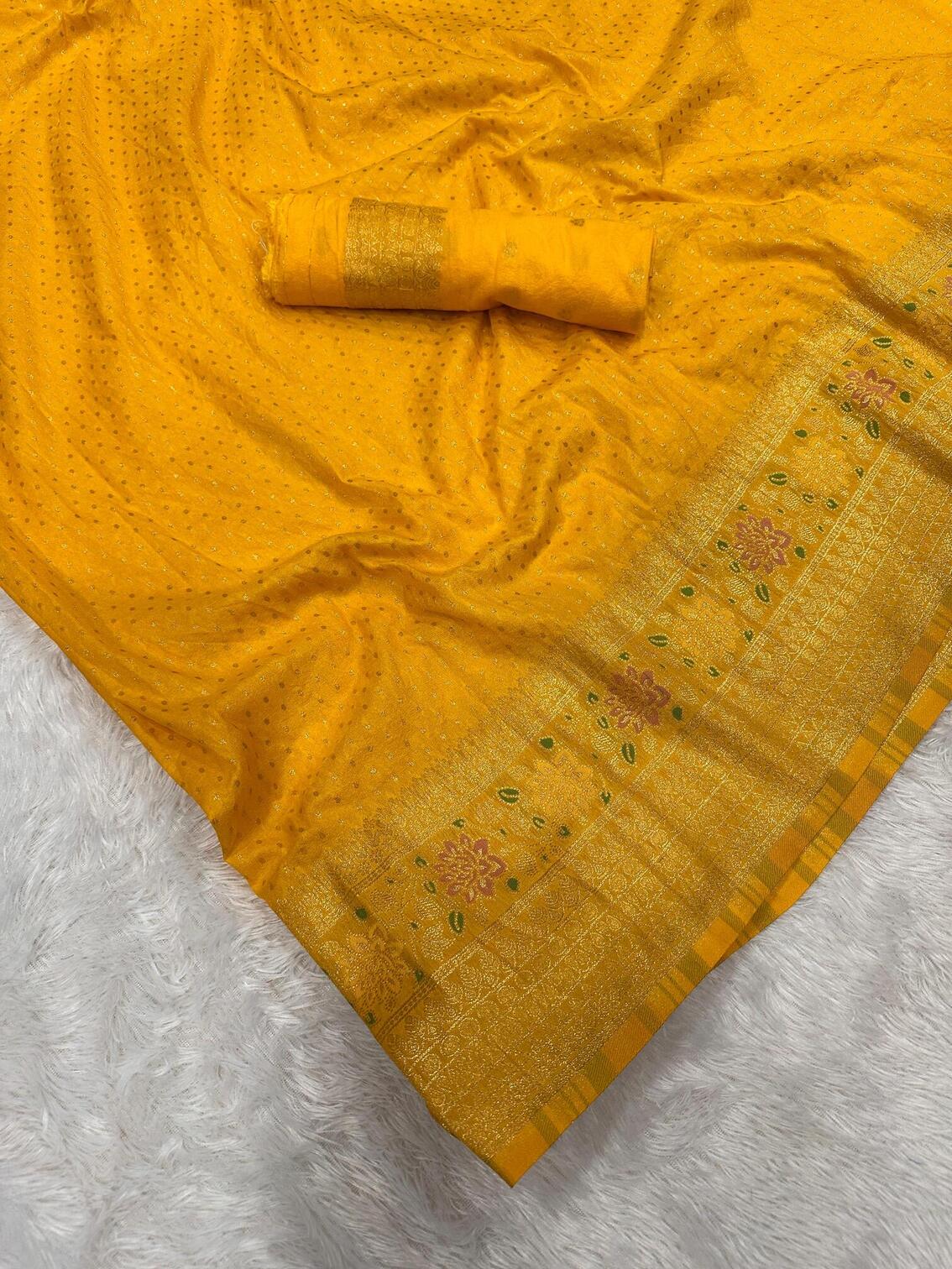Impressive Yellow Soft Banarasi Silk Saree With Rhapsody Blouse Piece