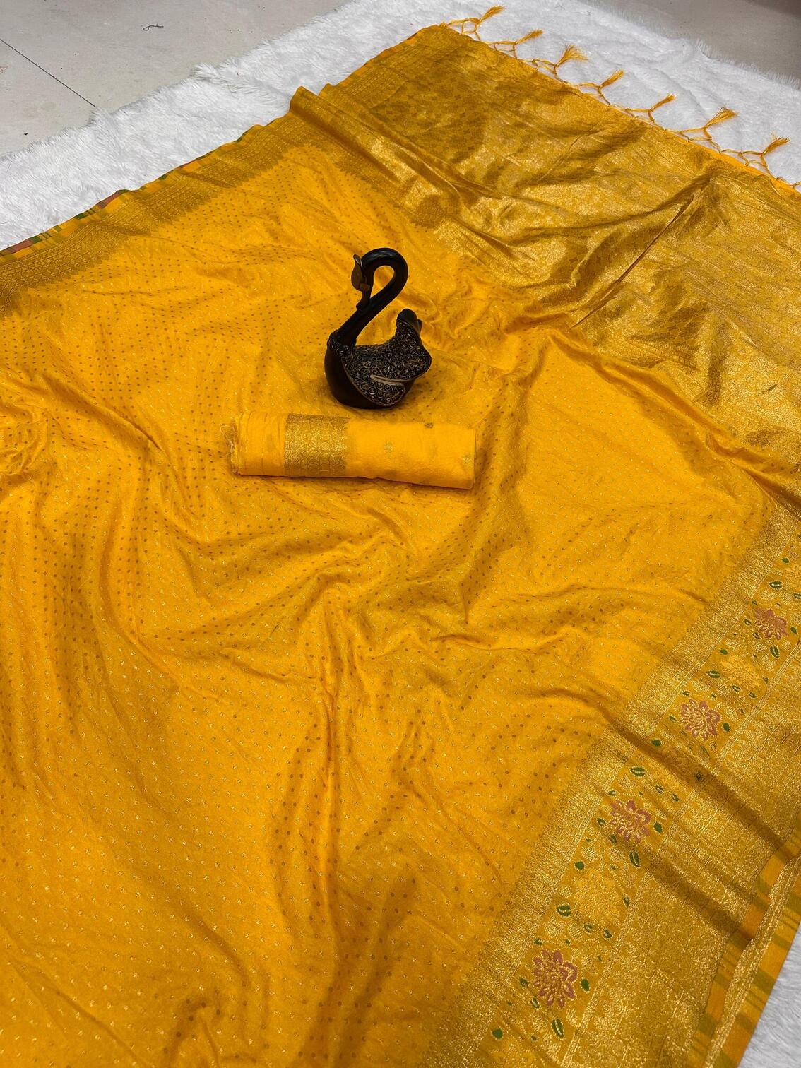 Impressive Yellow Soft Banarasi Silk Saree With Rhapsody Blouse Piece