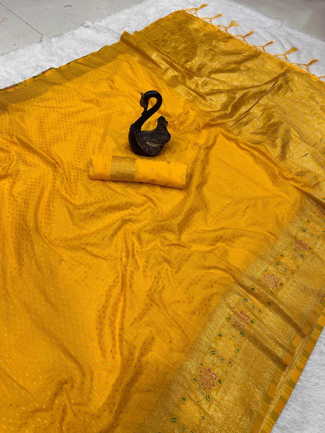 Impressive Yellow Soft Banarasi Silk Saree With Rhapsody Blouse Piece