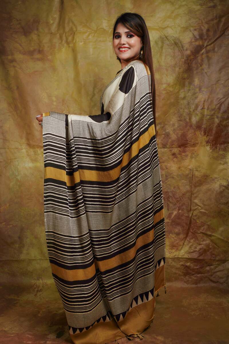 Murmurous Beige Digital Printed Crape Silk Saree With Panache Blouse Piece