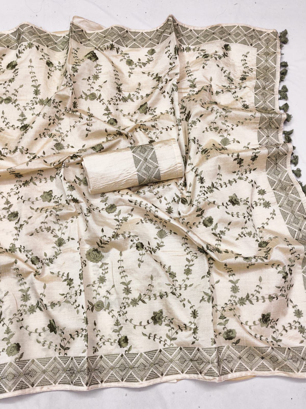 Whimsical Green Embroidery Work Tussar Silk Saree With Rhapsody Blouse Piece