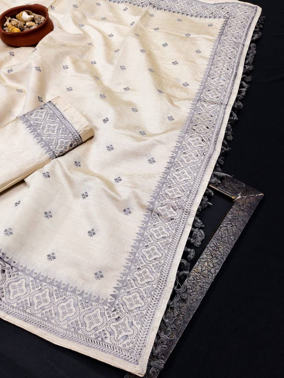 Exquisite Grey Embroidery Work Tussar Silk Saree With Opulent Blouse Piece