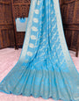 Surreptitious Sky Banarasi Dola Silk Saree With Smashing Blouse Piece