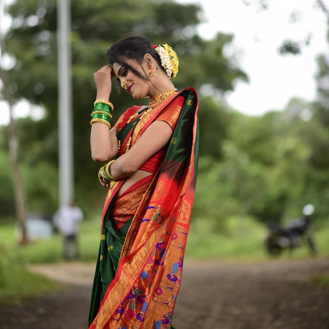 Captivating Green Paithani Silk Saree With Resplendent Blouse Piece