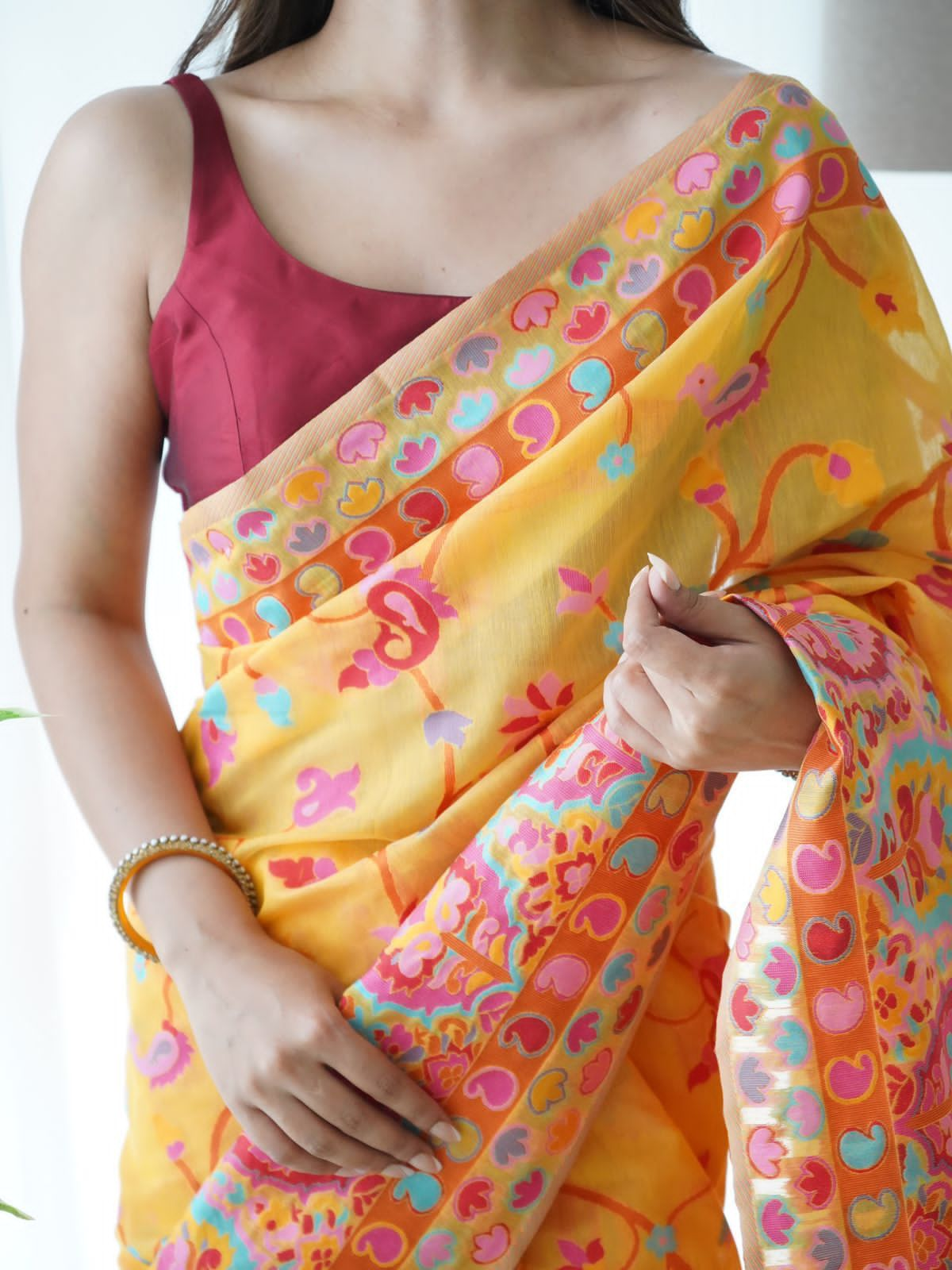 Cynosure Yellow Pashmina saree With Exuberant Blouse Piece