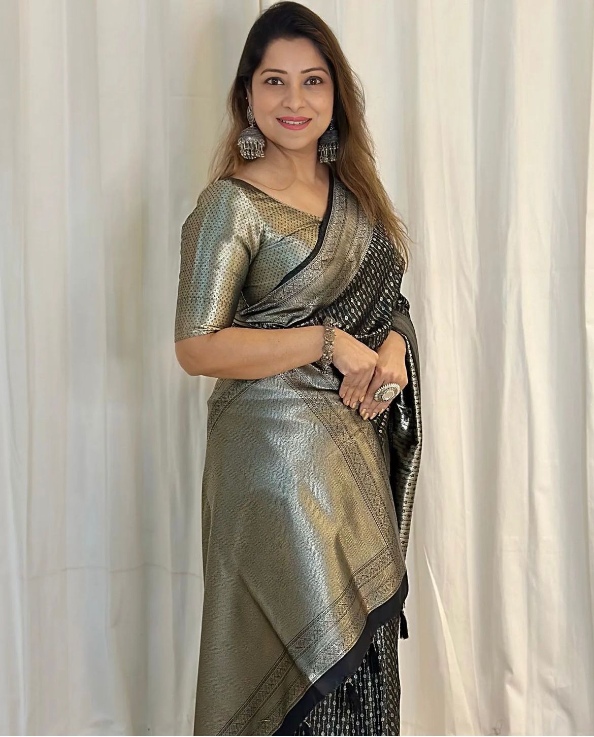 Fancifull Black Soft Silk Saree With Super Palimpsest Blouse Piece