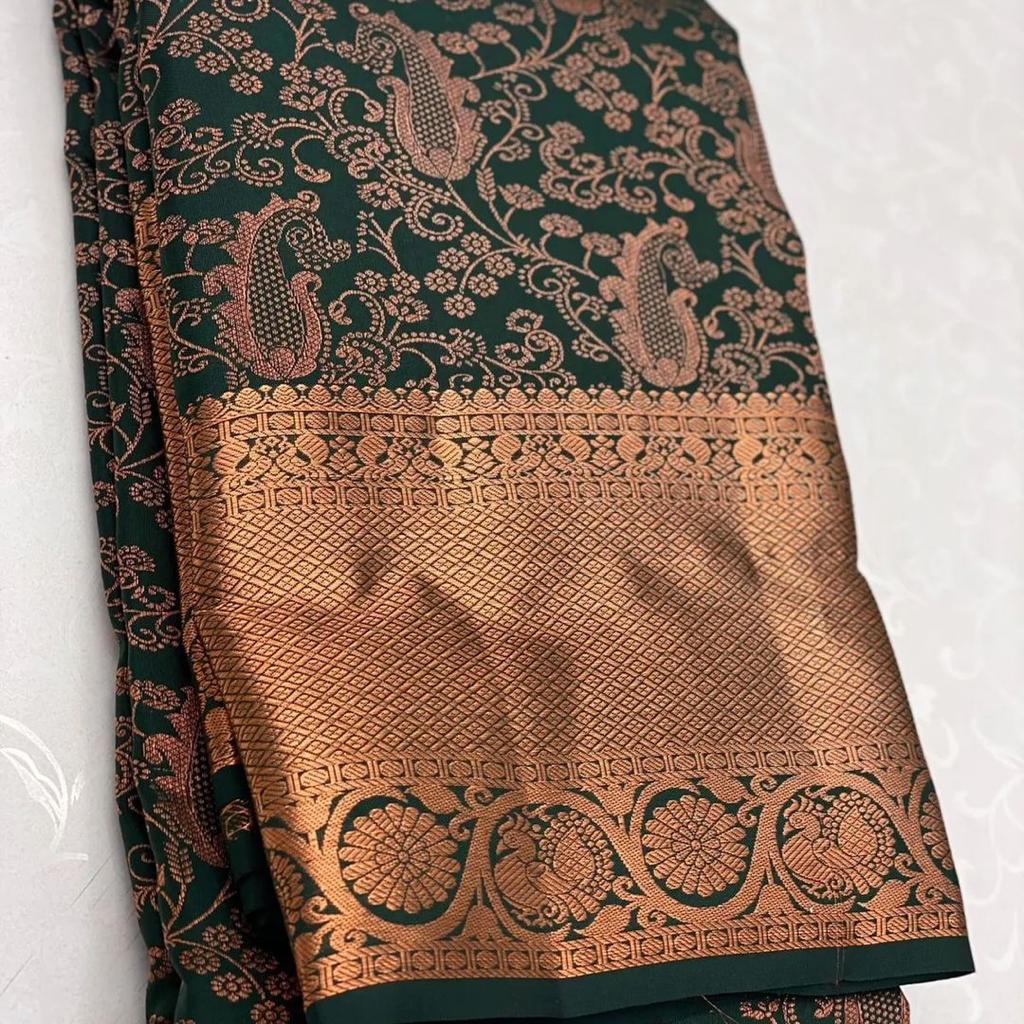 Extraordinary Dark Green Soft Silk Saree With Mellifluous Blouse Piece