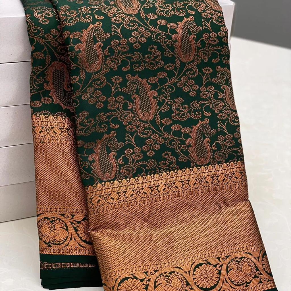 Extraordinary Dark Green Soft Silk Saree With Mellifluous Blouse Piece