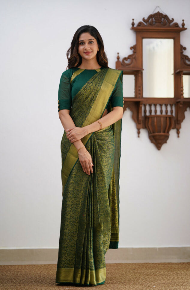 Sonorous Dark Green Soft Silk Saree With Lissome Blouse Piece