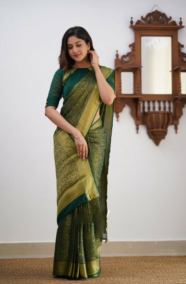 Sonorous Dark Green Soft Silk Saree With Lissome Blouse Piece