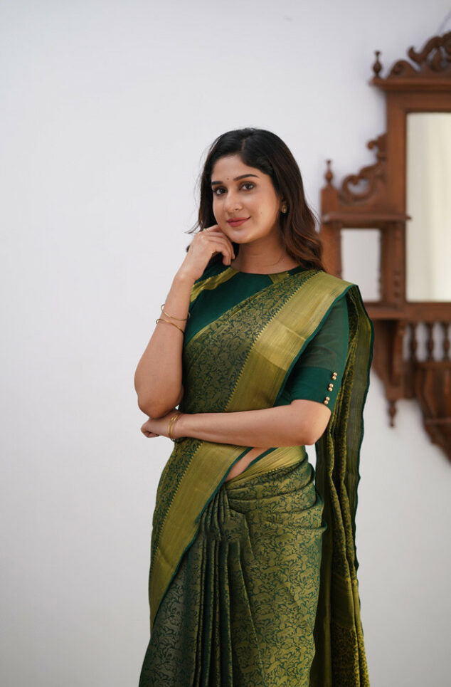 Sonorous Dark Green Soft Silk Saree With Lissome Blouse Piece